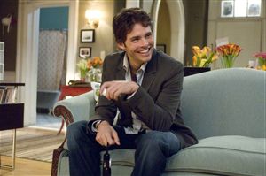 James Marsden tickles his invisible labrador.  Hope he's got the right end.