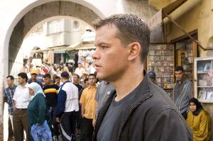 Matt Damon prepares to take two paces forward and poo on David Strathairn's head.