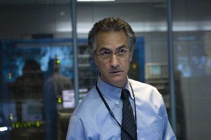 David Strathairn tries to remember where he left his umbrella.