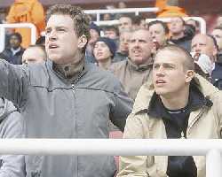 Rafe Spall and Charlie Hunnam, looking for streakers.