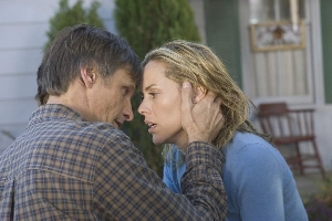 Viggo Mortensen checks that Maria Bello's head is screwed on.