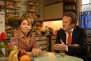 Colm Meaney tries to explain to Imelda Staunton that you can't phone home from a starship.