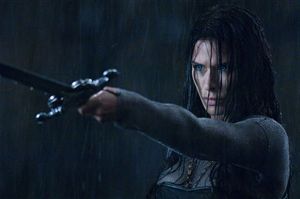 Rhona Mitra wished the police hadn't yelled 'Freeze!' at that particular moment, that sword's bloody heavy.
